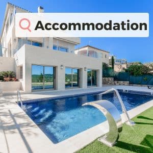 A picture of a house with swimming pool with the word 'accommodation' over the top
