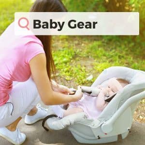A photo of a lady and a baby in a car seat with the words 'Baby Gear' over the top